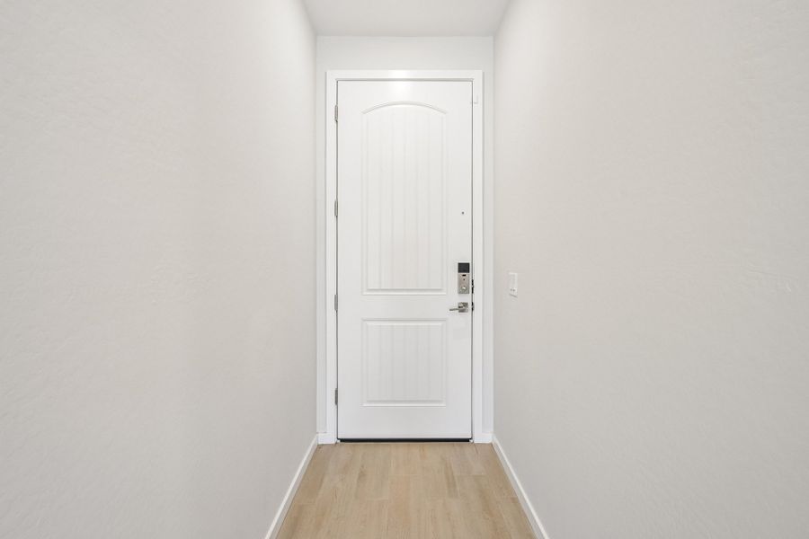 A white door in a room.
