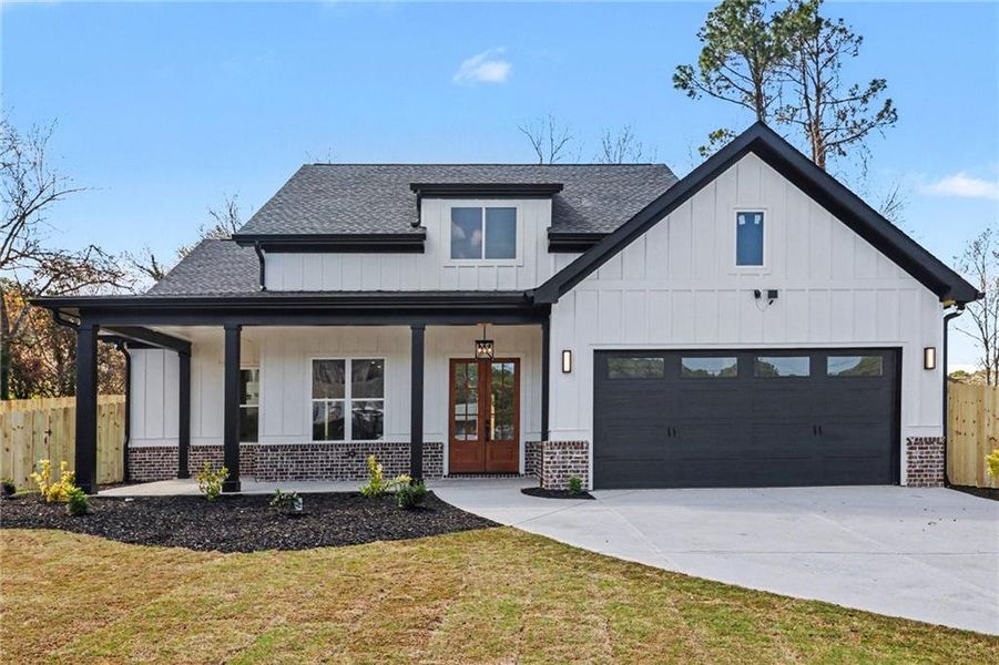 Front exterior of a new home in , Lawrenceville, GA, highlighting curb appeal (Image 26).