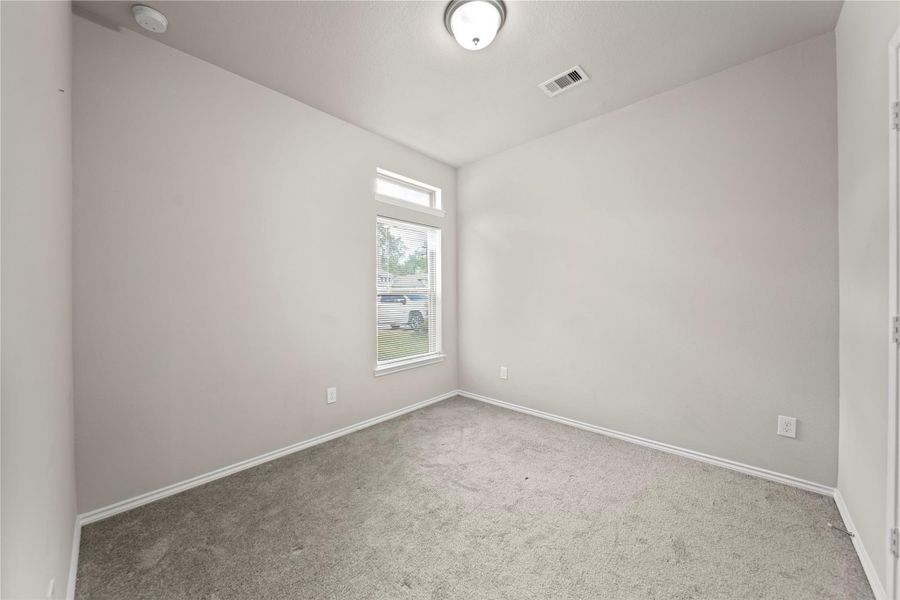 Spacious, unfurnished interior of a new home in The Meadows at Imperial Oaks 40', Conroe (Image 14).