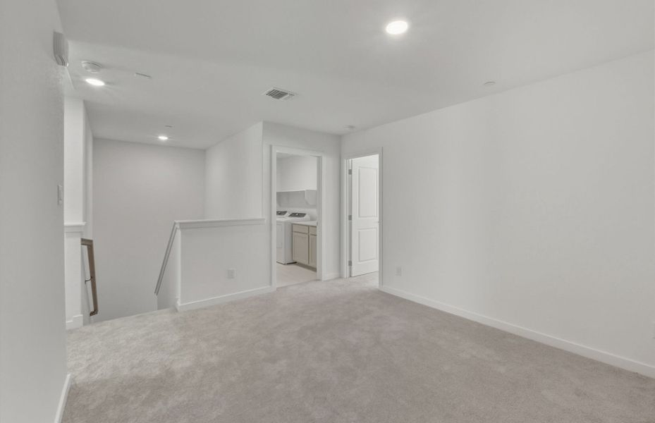 Spacious, unfurnished interior of a new home in Monarch on Main, Round Rock (Image 20).