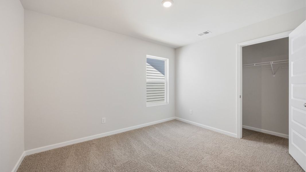 Spacious, unfurnished interior of a new home in Shoal Creek, Hampton (Image 22).