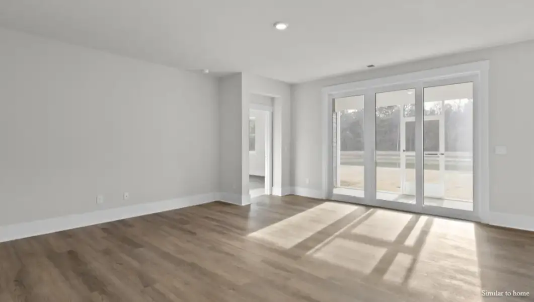 Spacious, unfurnished interior of a new home in The Highlands at Cedar Hill Landing, Navassa (Image 23).