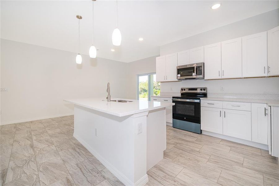 Furnished interior view inside a new home in , Kissimmee (Image 5). Furnished interior view inside a new home in , Kissimmee (Image 5).