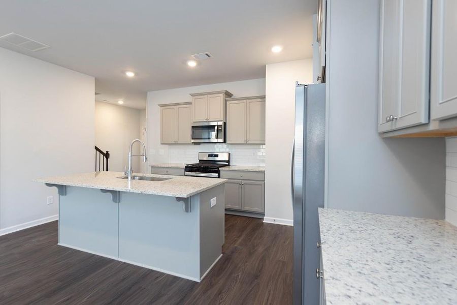 Furnished interior view inside a new home in , Suwanee (Image 5).