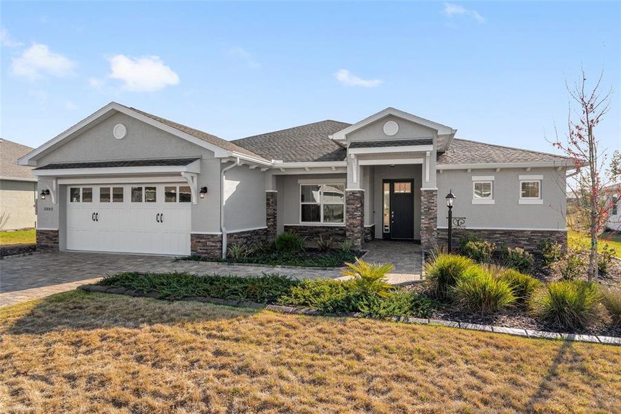 Front exterior of a new home in , Ocala, FL, highlighting curb appeal (Image 28).