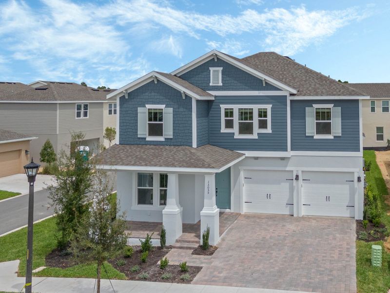 Representative exterior photo of a completed home built from the Faulkner by Rockwell Homes in Northlake at Ovation, Winter Garden, FL (Image 31). Representative exterior photo of a completed home built from the Faulkner by Rockwell Homes in Northlake at Ovation, Winter Garden, FL (Image 31).