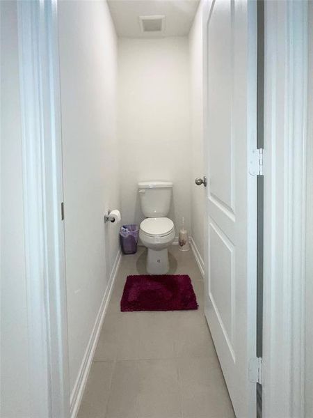 Private toilet area in primary bath.