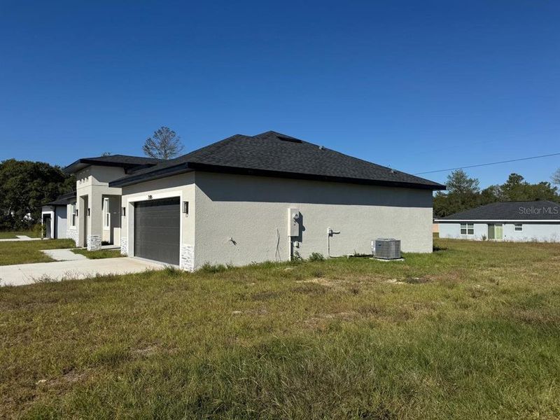 Exterior details and patio area of a home in , Ocala (Image 2).