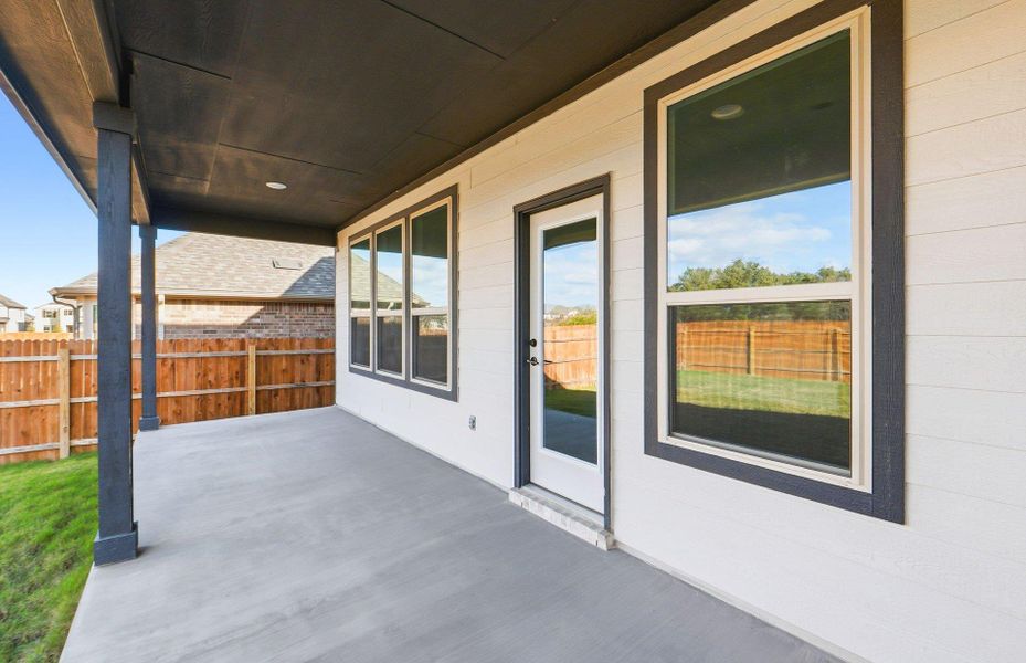 Exterior details and patio area of a home in Saddleback at Santa Rita Ranch, Liberty Hill (Image 3). Exterior details and patio area of a home in Saddleback at Santa Rita Ranch, Liberty Hill (Image 3).