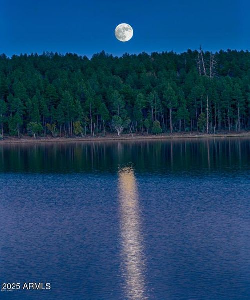 Beautiful full moon with lake reflection Beautiful full moon with lake reflection