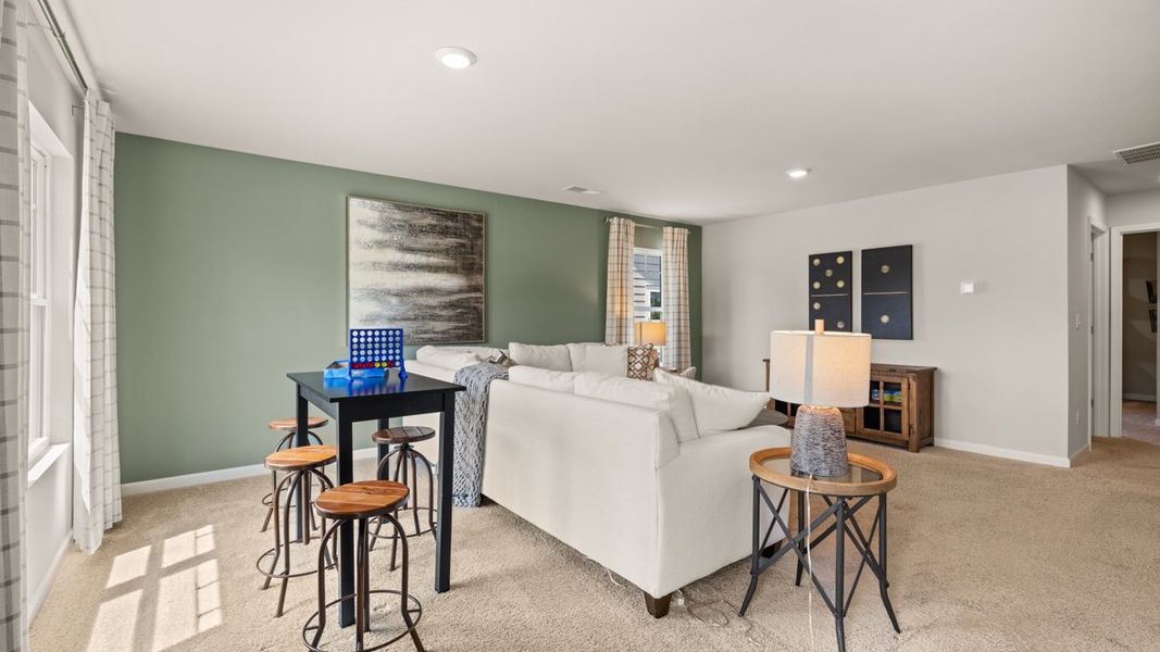 Representative furnished interior of a home built from the Elle by D.R. Horton in Twin Lakes, Hoschton (Image 28).