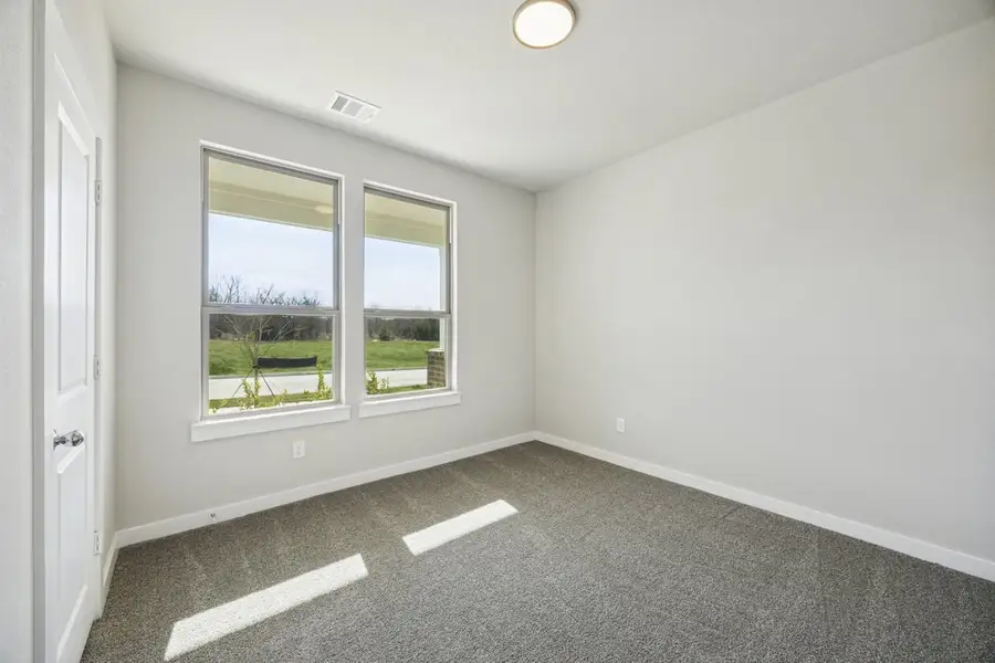 Representative unfurnished interior of a home built from the The Elm by Lillian Custom Homes in Hickory Hill, Sherman (Image 32).