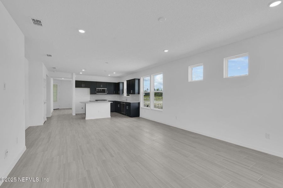 Spacious, unfurnished interior of a new home in Del Webb Wildlight, Yulee (Image 15).