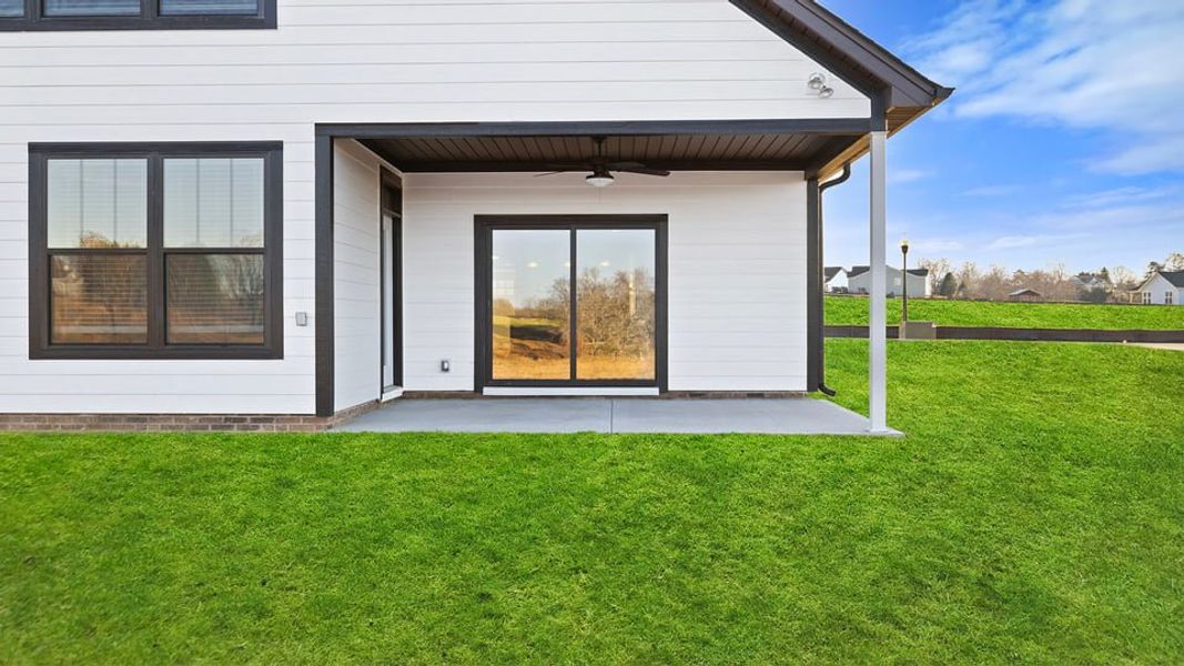 Exterior details and patio area of a home in Alder Pond, Campobello (Image 3).