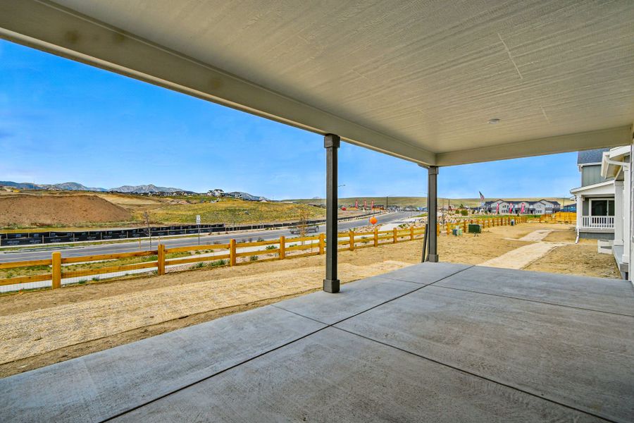 Exterior details and patio area of a home in Trailstone, Arvada (Image 25).