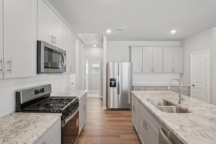 Photo is not of the actual home, but is an inspirational photo of builder’s model home and may depict options, furnishings, and/or decorator features that are not included.