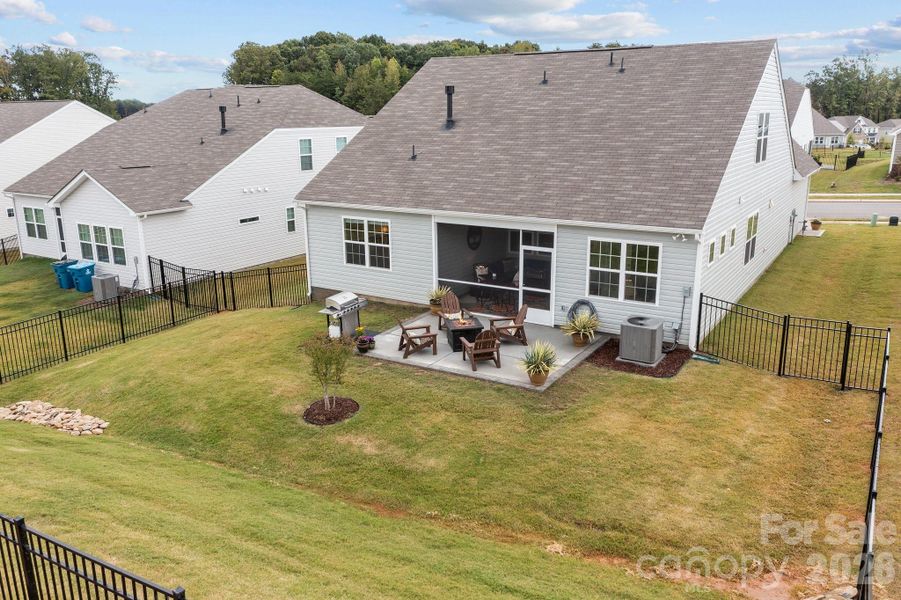 Bermuda lawn is already greening up.  Make this backyard into your own.  Meticulously maintained and fenced with extra large patio already poured, including a special area for your grill.  Imagine twinkle lights and some August Beauty gardenias to round out your yard!