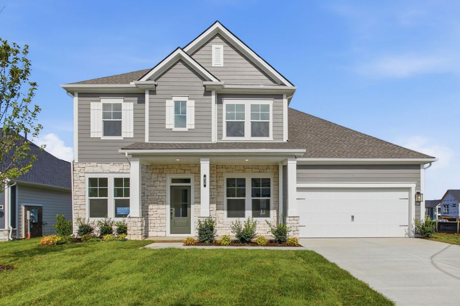 Front exterior of a new home in Heritage Green – The Signature Collection, Columbia, TN, highlighting curb appeal (Image 1). Front exterior of a new home in Heritage Green – The Signature Collection, Columbia, TN, highlighting curb appeal (Image 1).