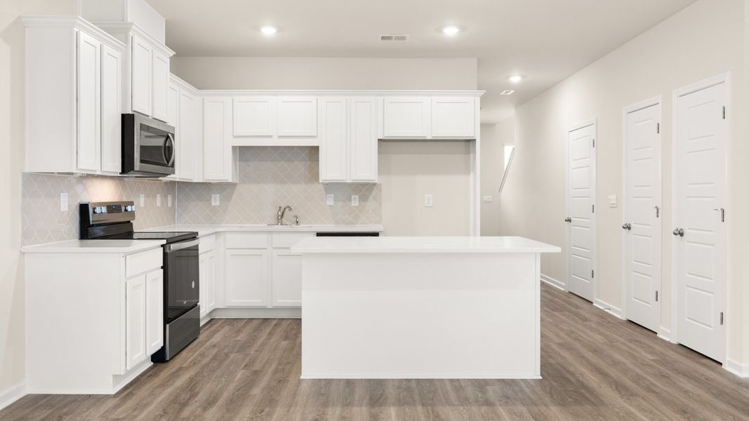 Furnished interior view inside a new home in The Gables at Agricultural Village, Perry (Image 6).