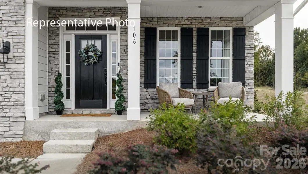 Exterior details and patio area of a home in Sylvan Creek, Denver (Image 23).