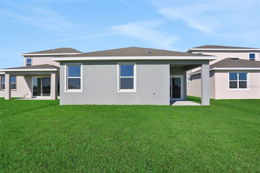 Exterior details and patio area of a home in Turnleaf, Punta Gorda (Image 3).