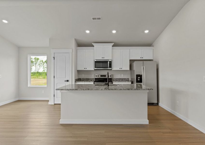 The kitchen has granite countertops