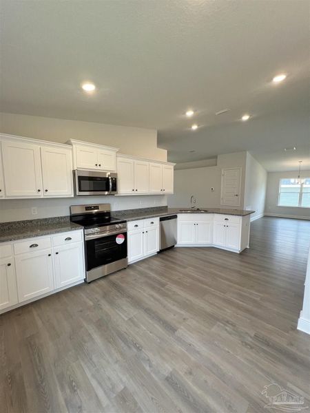 Furnished interior view inside a new home in Pine Top, Cantonment (Image 5).