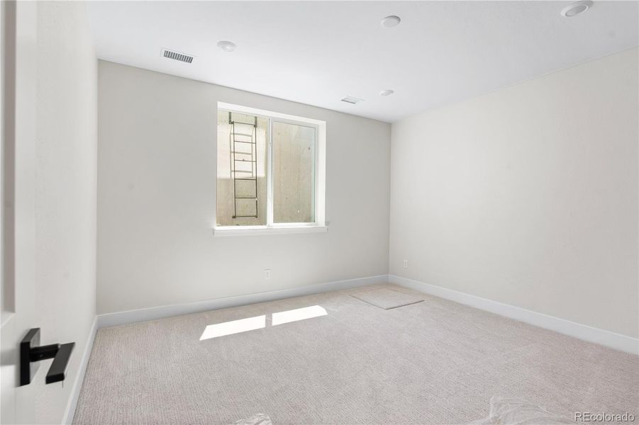 Spacious, unfurnished interior of a new home in Luxe at The Canyons, Castle Pines (Image 26).