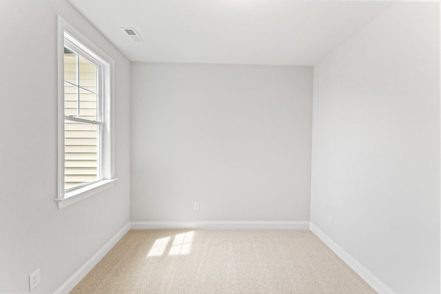 Representative unfurnished interior of a home built from the The Hemlock by RobuckHomes in Kennebec Crossing, Angier (Image 153).