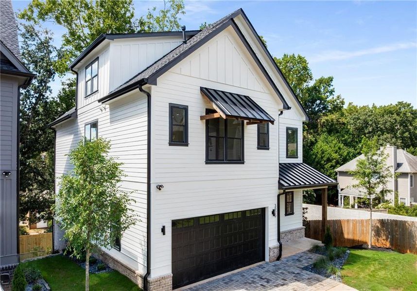 Front exterior of a new home in , Smyrna, GA, highlighting curb appeal (Image 1).