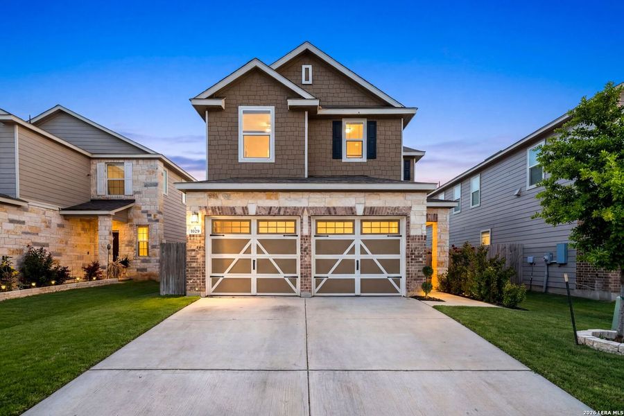 Front exterior of a new home in Berry Springs, Georgetown, TX, highlighting curb appeal (Image 22).