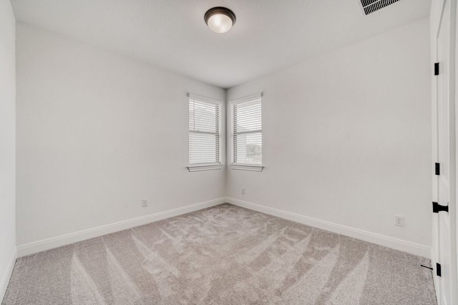 Spacious, unfurnished interior of a new home in The Porch at Du Pre, Buda (Image 17).