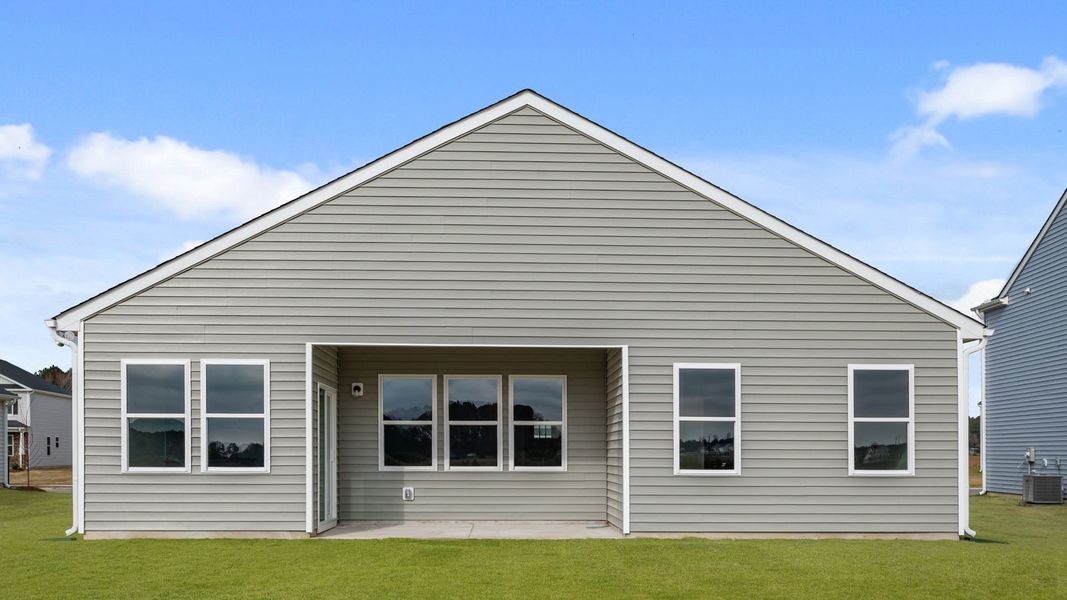 Exterior details and patio area of a home in East Ridge, Ayden (Image 23).