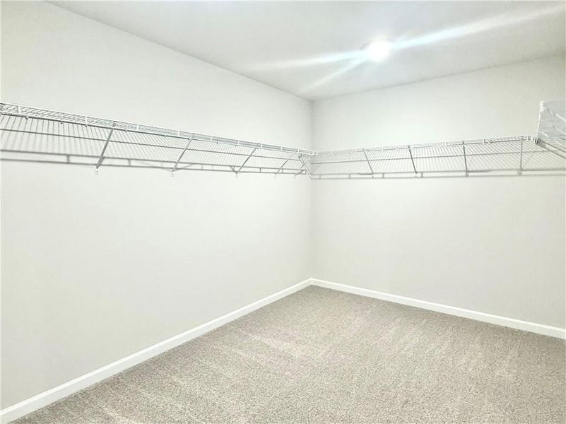 Spacious, unfurnished interior of a new home in Vines at Mill Creek - Estate Series, Braselton (Image 20). Spacious, unfurnished interior of a new home in Vines at Mill Creek - Estate Series, Braselton (Image 20).