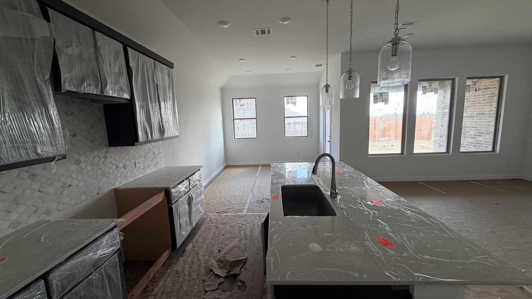 Open Kitchen-Dining Room Construction Progress featuring the Roosevelt Collection