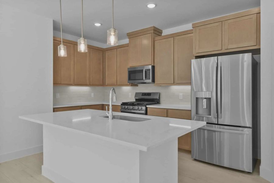 Representative furnished interior of a home built from the Chalet by Chesmar Homes in Meridiana Townhomes, Iowa Colony (Image 7).