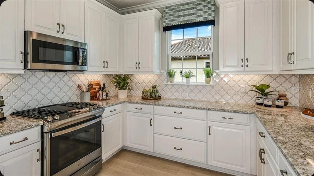Furnished interior view inside a new home in Esplanade at Azario Lakewood Ranch, Bradenton (Image 14).