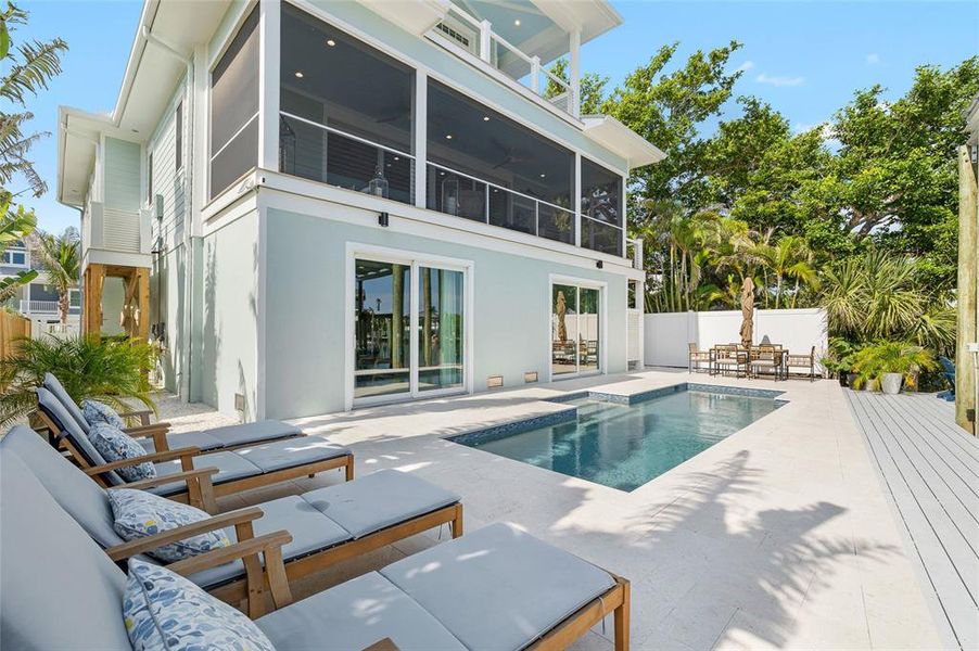 Front exterior of a new home in , Boca Grande, FL, highlighting curb appeal (Image 30). Front exterior of a new home in , Boca Grande, FL, highlighting curb appeal (Image 30).