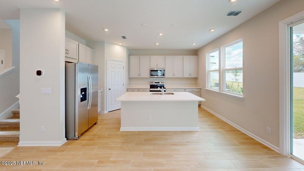 Furnished interior view inside a new home in Sandridge Hills, Green Cove Springs (Image 4). Furnished interior view inside a new home in Sandridge Hills, Green Cove Springs (Image 4).