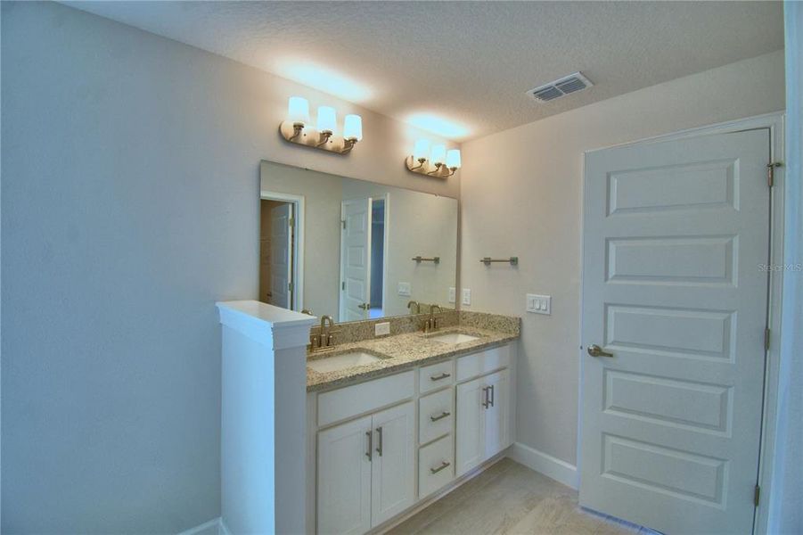 Furnished interior view inside a new home in Lake Juliana Estates, Auburndale (Image 13).