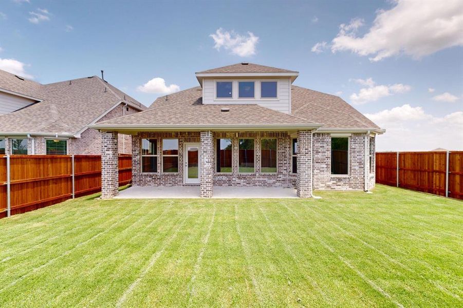 Front exterior of a new home in Lilybrooke at Legacy Hills, Celina, TX, highlighting curb appeal (Image 21).