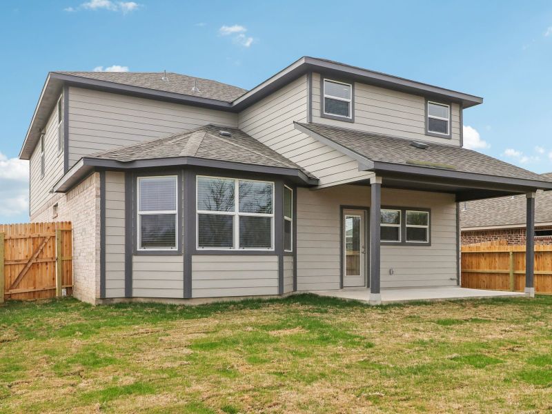 Back exterior of the Medina floorplan at a Meritage Homes community. Back exterior of the Medina floorplan at a Meritage Homes community.