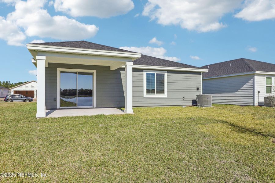 Exterior details and patio area of a home in Cypress Meadows - Signature Series, Jacksonville (Image 20).