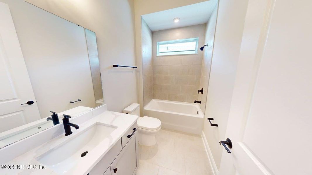 Furnished interior view inside a new home in RiverTown - WaterSong, St. Johns (Image 8).