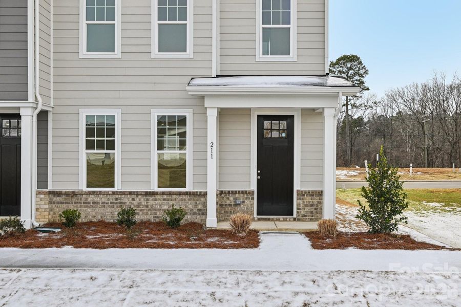 Exterior details and patio area of a home in The Crossing at Cramerton Mills, Cramerton (Image 3).