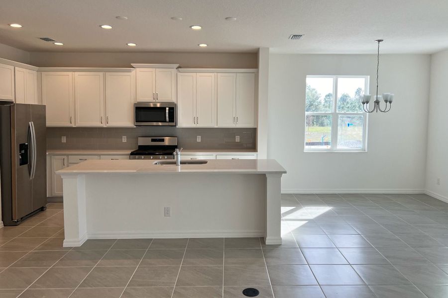 Furnished interior view inside a new home in Eagletail Landings, Howey-in-the-Hills (Image 5). Furnished interior view inside a new home in Eagletail Landings, Howey-in-the-Hills (Image 5).