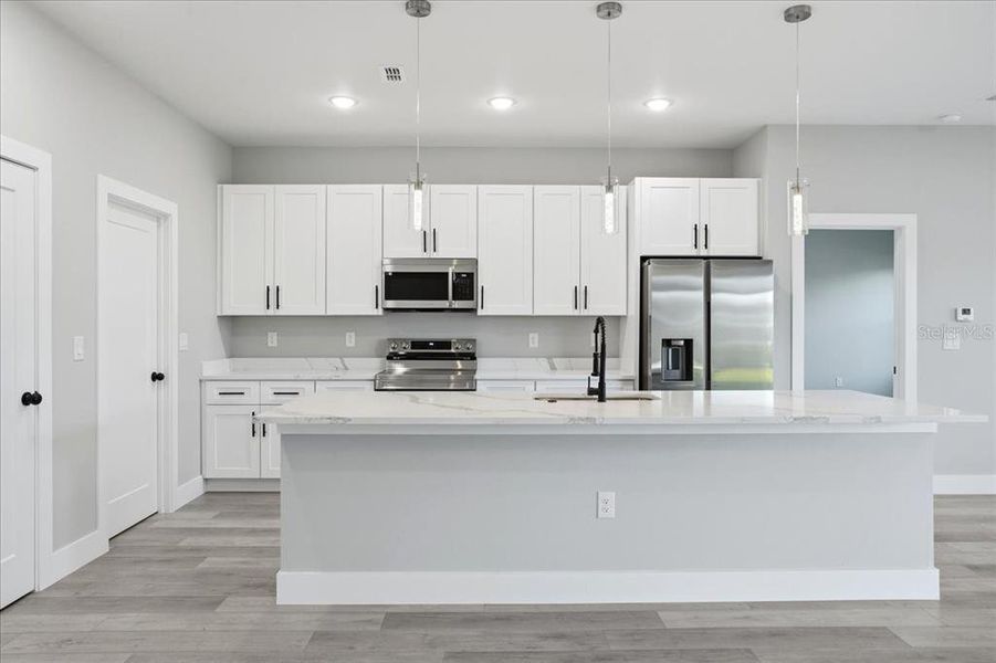 Furnished interior view inside a new home in , Port Charlotte (Image 11).