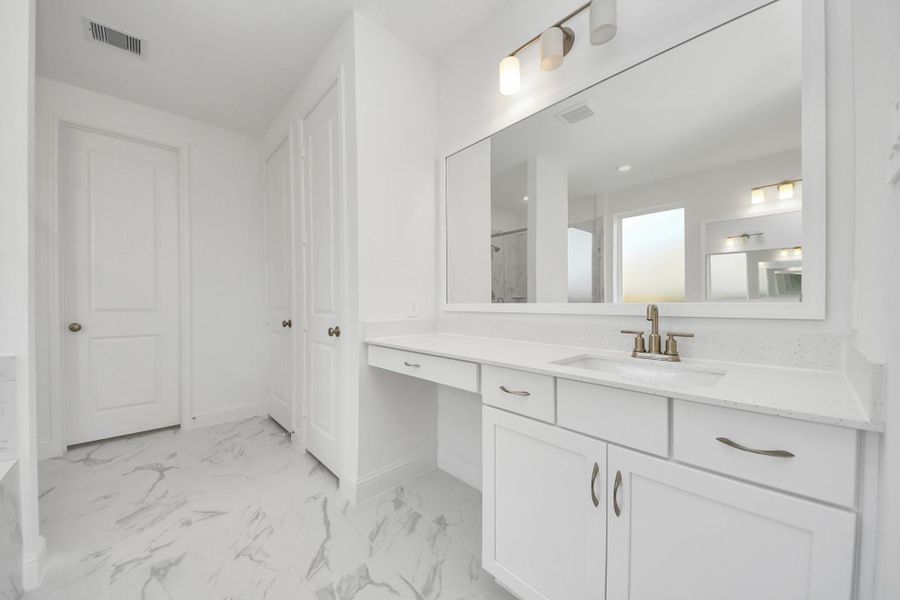 Furnished interior view inside a new home in ARTAVIA, Conroe (Image 8).