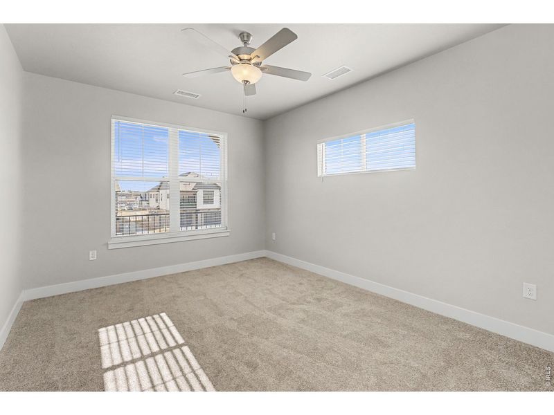 Spacious, unfurnished interior of a new home in Highlands at Fox Hill - The Flats, Longmont (Image 13).