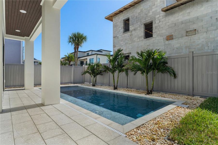 Exterior details and patio area of a home in , New Smyrna Beach (Image 64).